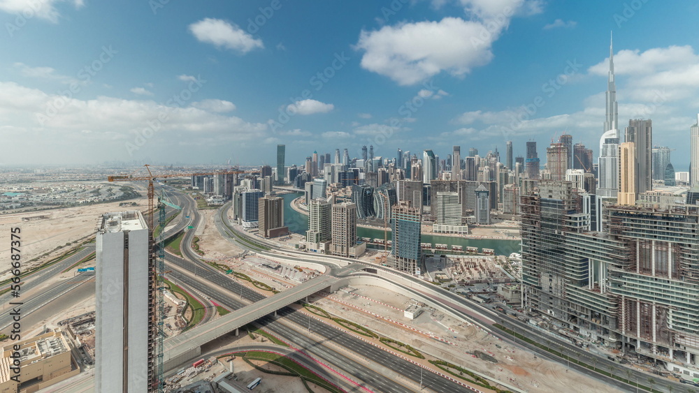 Panorama showing skyline of Dubai with business bay and downtown district .