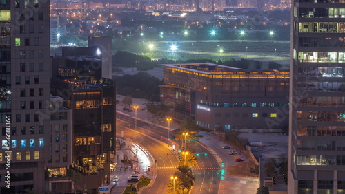 Skyline view of traffic on Al Saada street near DIFC district night to day in Dubai  UAE.