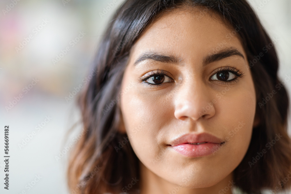 Closeup Shot Of Young Arab Female Face Looking At Camera