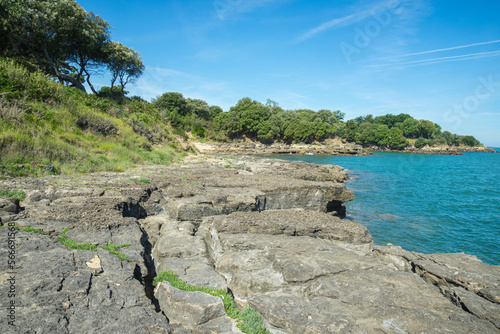 Rocky coastline and turquoise ocean at island Ile d'Aix, Charente Maritime, west Atlantic coast France