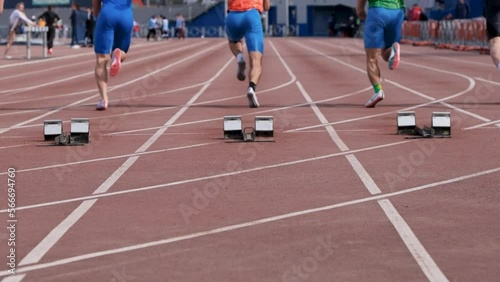 Chelyabinsk, Russia - June 5, 2022: start men athletes run 100 meters in UFD Athletics Championship photo
