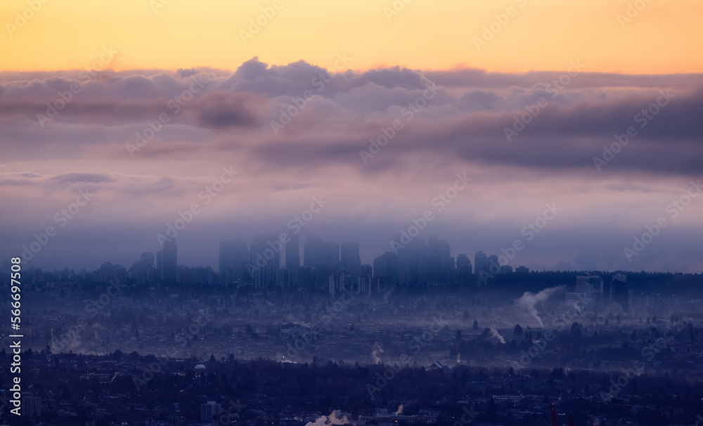 Metrotown City viewed from Cypress Lookout. Cloudy and Foggy Sunrise. Vancouver, British Columbia, Canada.