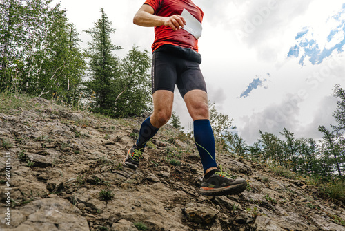 male runners compression socks run down mountain