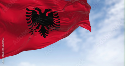 Close-up view of the Albanian national flag waving in the wind