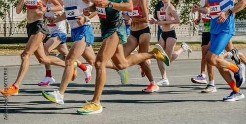 group runners athletes running city marathon