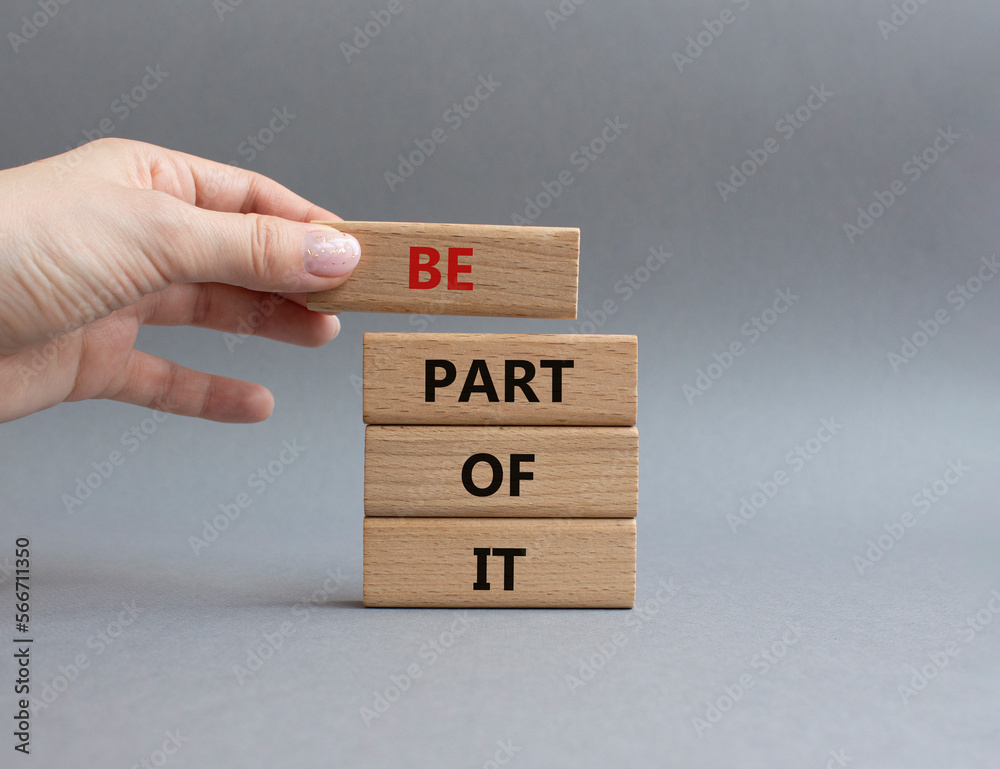 Be part of it symbol. Concept words Be part of it on wooden blocks. Beautiful grey background. Businessman hand. Business and Be part of it concept. Copy space. Be part of it symbol. Concept words Be part of it on wooden blocks. Beautiful grey background. Businessman hand. Business and Be part of it concept. Copy space.