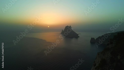 Sunset, golden hour at ibiza es vedra island. Perfect aerial view flight drone photo