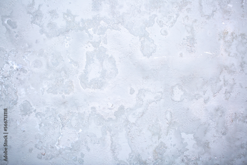 Fototapeta premium Texture of paint stains on the wall, cracked paint on an old metal surface. Sheet of silver metal with cracked and peeling paint, background for design with copy space.