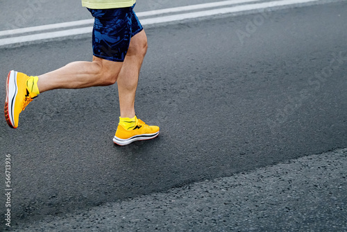 legs runner in bright running shoes run