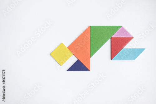 Free Download color tangram puzzle in kneel down shape on white background - GFXLoad