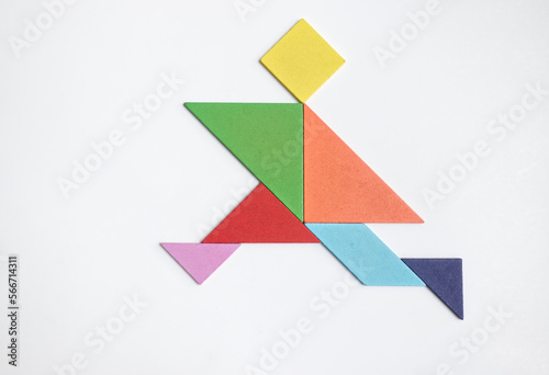 Free Download Color tangram puzzle in running man shape on white background - GFXLoad