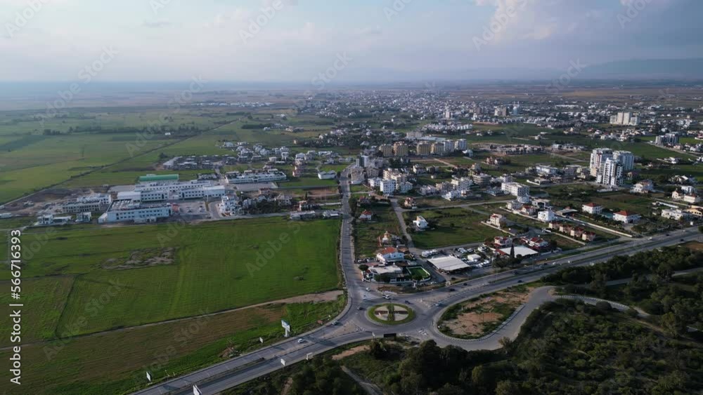Northern Cyprus. Drone video. A beautiful area of Cyprus. Buildings, fields and the sea from a bird's eye view. Beautiful landscape. City life. A tourist place. Lots of greenery. Northern Cyprus. Drone video. A beautiful area of Cyprus. Buildings, fields and the sea from a bird's eye view. Beautiful landscape. City life. A tourist place. Lots of greenery.