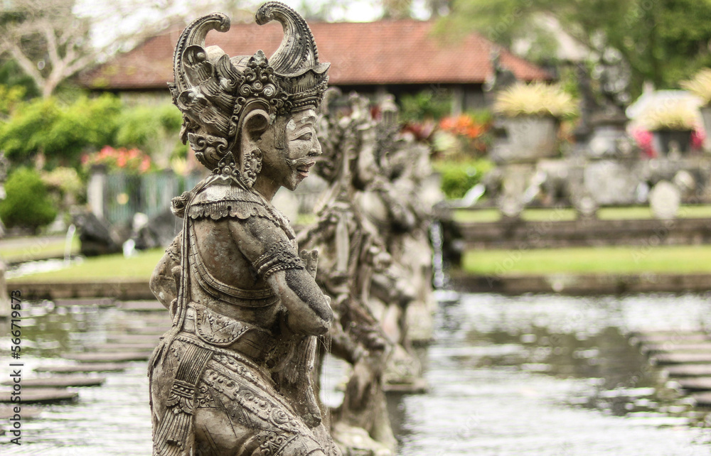Traditional Balinese statues in the water temple in Bali, Indonesia