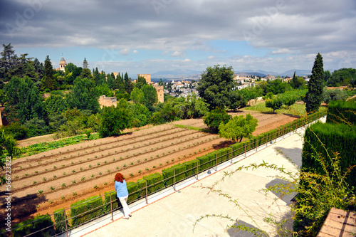 Huertas y jardines del Generalife con la Alhambra y la ciudad de Granada al fondo, Andalucía, España. Patrimonio de la Humanidad por la Unesco photo