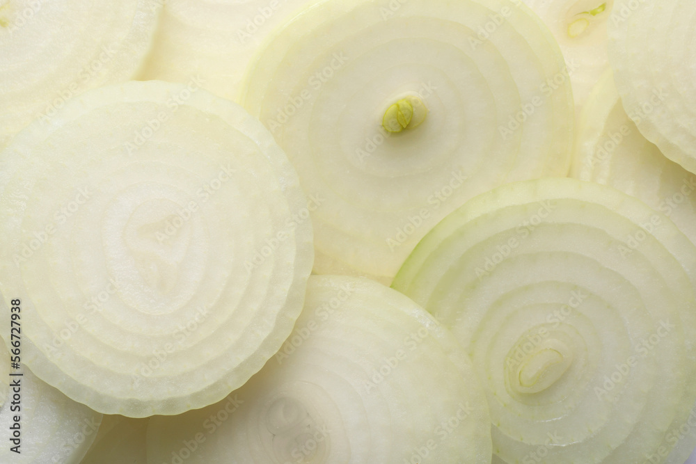 Slices of fresh ripe onion as background, top view Slices of fresh ripe onion as background, top view