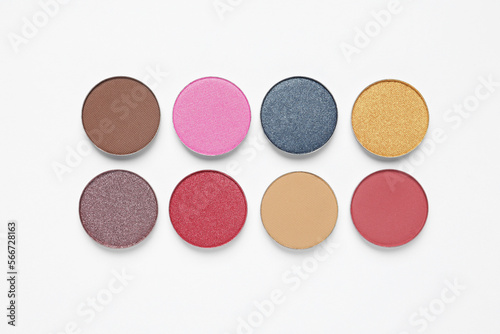 Different beautiful eye shadows on white background, flat lay