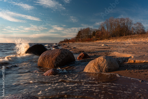 Fototapeta Naklejka Na Ścianę i Meble -  Rocky beach of the Baltic Sea at sunset