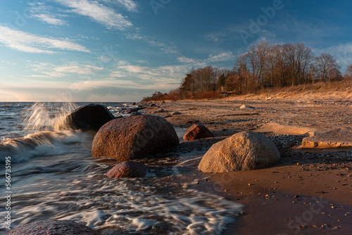 Fototapeta Naklejka Na Ścianę i Meble -  Rocky beach of the Baltic Sea at sunset