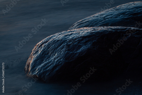 Fototapeta Naklejka Na Ścianę i Meble -  Rocky beach of the Baltic Sea at sunset