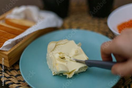 Desayuno con mantequilla y mermelada en una tostada photo