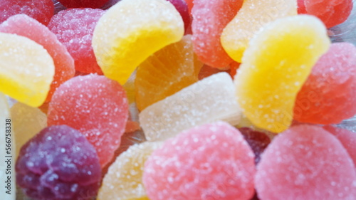 Marmalade of different colors sprinkled with sugar