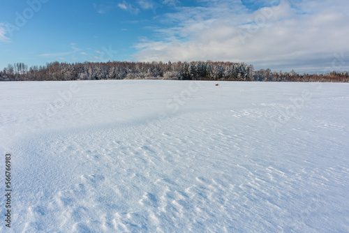 sunny, snowy winter day in the countryside