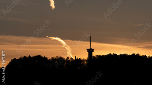 A beautiful sunset in jena with a tree line in the foreground