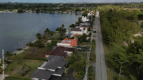 Aerial view looking down from above at luxury real estate in an upscale neighborhood photo