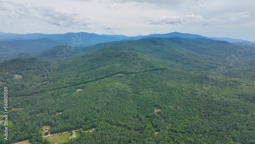 Flying over the Campton Mountain in summer with White Mountain National Forest at the background in town of Campton, New Hampshire NH, USA.  photo