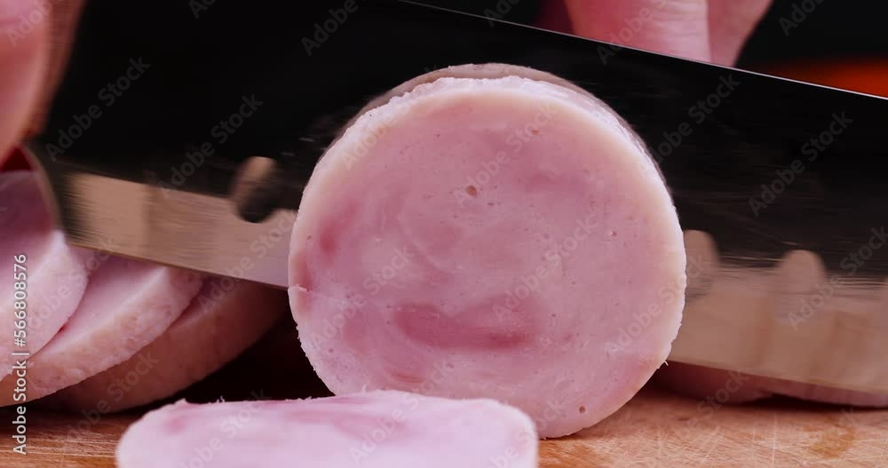 Sliced round-shaped ham from chicken meat, freshly sliced chicken ham in the kitchen