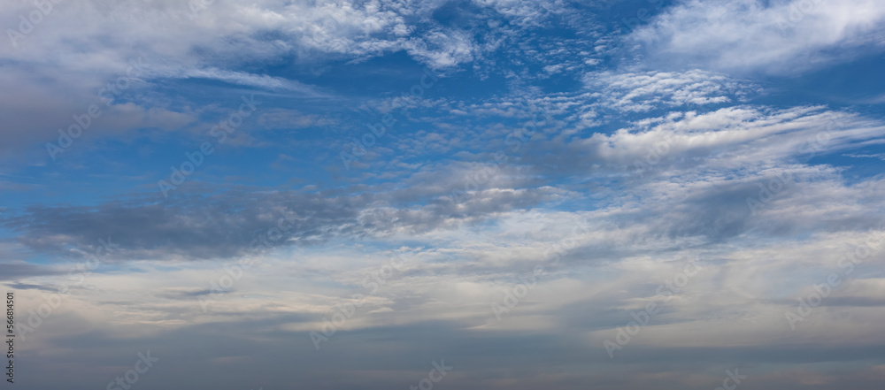 Blue sky with clouds background overlay. Ideal for sky replacement	