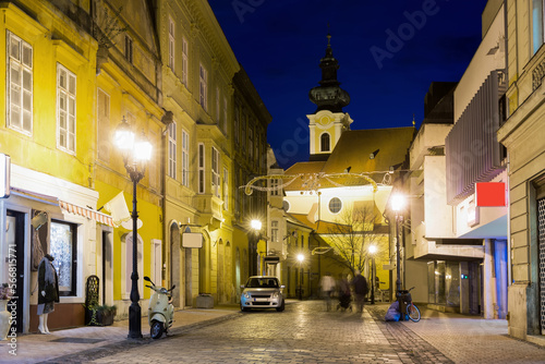 View on night streets of Gyor is colorful landmark of Hungary outdoors.