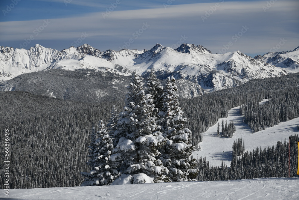 Breathtaking top view to the snow capped peaks of the Colorado Rockies in winter, Vail Ski Resort.