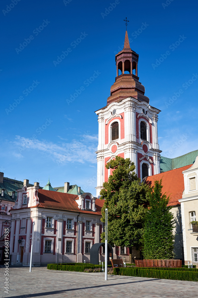 The historic belfry of the baroque monastic church in the city of Poznan