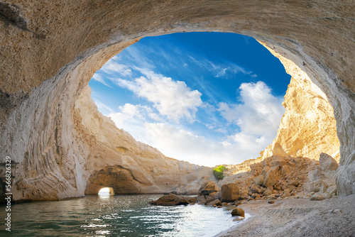 View of the volcanic open cave of Sykia, Milos island, Cyclades, Greece photo