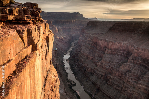 A woman rappelling off Toroweap Overlook, Grand Canyon National Park, Fredonia, Arizona. photo