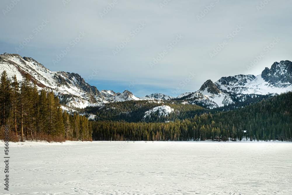 Mammoth mountain during winter. the frozen lake cover with snow.