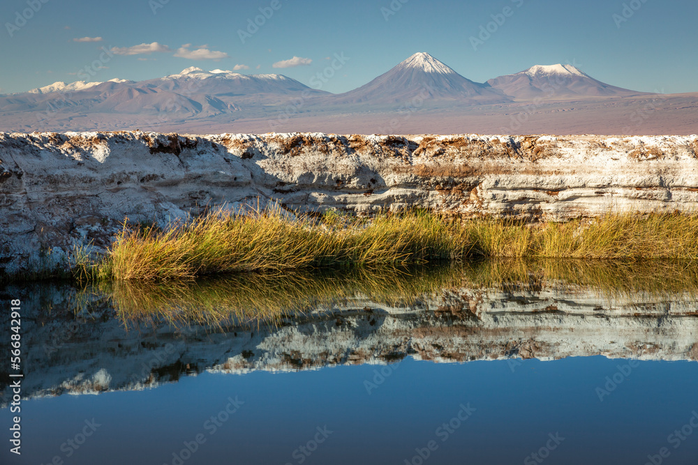 Licancabur with reflection lake and volcanic landscape at Sunset, Atacama, Chile