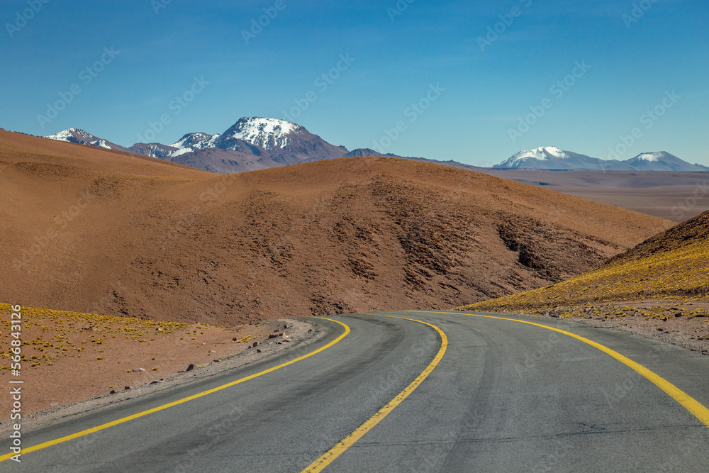 Road in Moon Valley dramatic landscape at Sunset, Atacama Desert, Chile