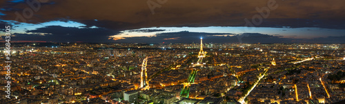 Aerial panorama of Paris at dusk  France