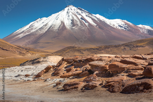 Dramatic volcanic landscape in Piedras Rojas at sunny day, Atacama Desert, Chile photo