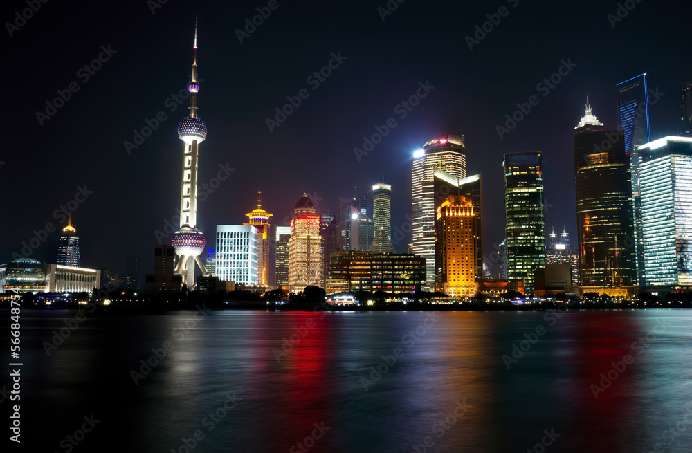 Shanghai landmark skyline at night in China with Huangpu river