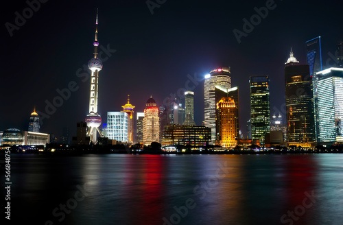 Shanghai landmark skyline at night in China with Huangpu river