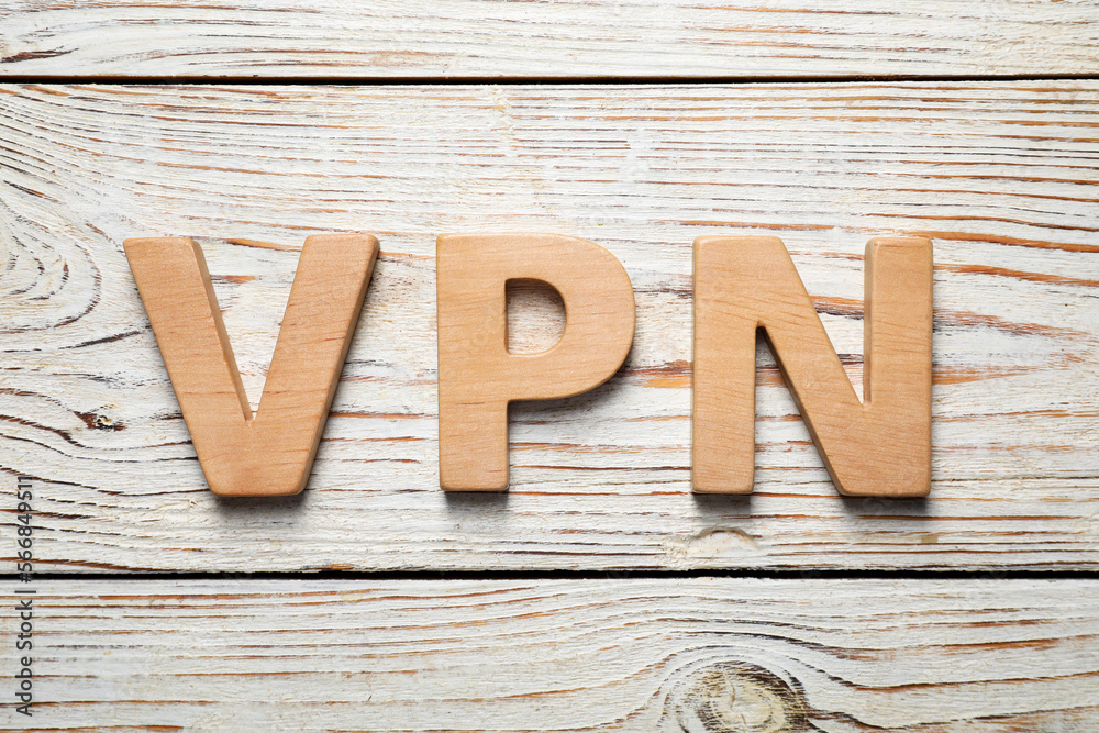 Acronym VPN made of wooden letters on table, flat lay Acronym VPN made of wooden letters on table, flat lay