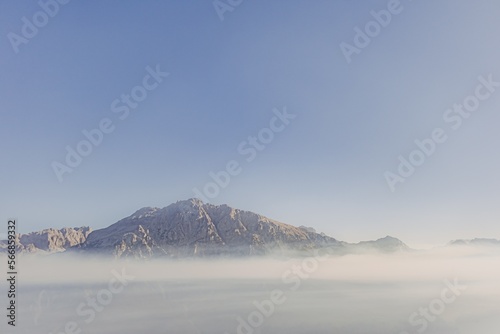 View of mountain top above clouds on the way to Theth, Albania.