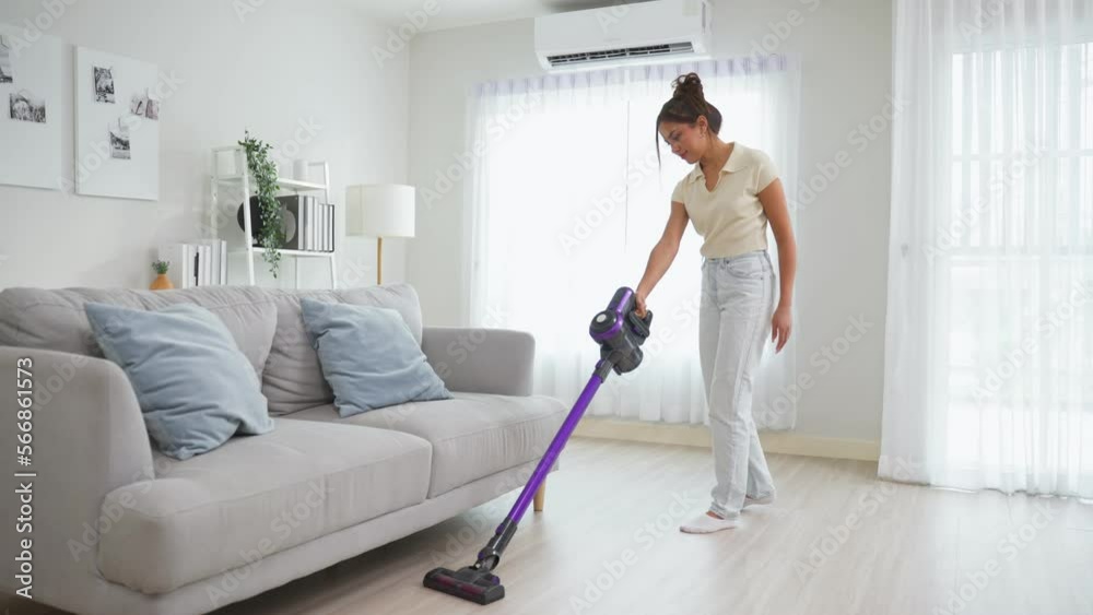 Caucasian cleaning service woman worker cleaning living room at home. Caucasian cleaning service woman worker cleaning living room at home.