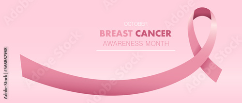 Banner with pink awareness ribbon and text OCTOBER BREAST CANCER AWARENESS MONTH on pink background