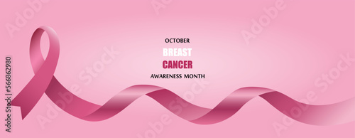Banner with pink awareness ribbon and text OCTOBER BREAST CANCER AWARENESS MONTH on pink background