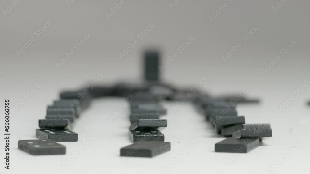 three rows of black dominoes with white dots three rows of black dominoes with white dots