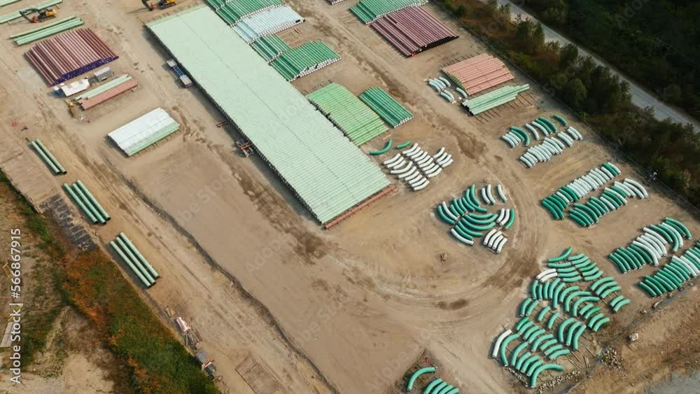 Oil and gas pipeline building. Materials to construct the TMX oil pipeline in BC. The fossil fuel industry's pipe of oil from the Alberta Oil Sands to export crude petroleum products.